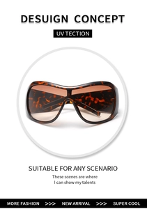 Detail of tortoise shell oversized shield sunglasses with UV protection on white background