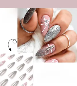 Pink matte press-on nails with silver glitter, white geometric lines and rhinestone accents