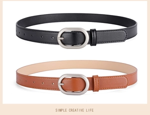 Detailed view of black and brown PU leather belts with silver oval metal buckles