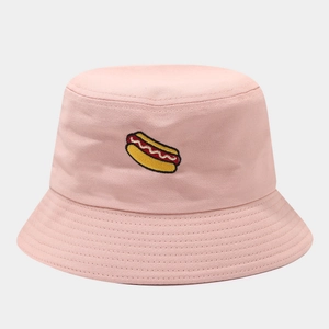 Close-up of hot dog embroidery on a pink cotton bucket hat with fine stitching