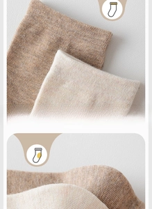 Close-up of elastic ribbed cuffs on cotton blend socks in brown and beige tones