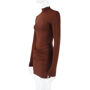 Side view of dark brown high-neck mini dress showing ruched details and slim fit shape