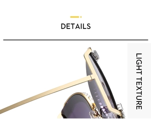 Detail of gold metal sunglasses frame with diamond inlay and purple gradient lenses