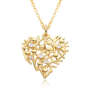 Close-up of heart pendant with gold finish and five micro-paved white zircons on a thin chain