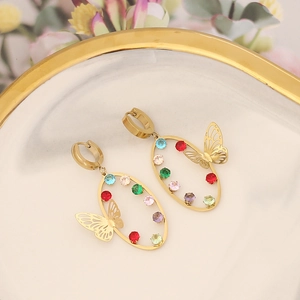 Detail of butterfly hollow gold earrings with colorful round cut cubic zirconia stones