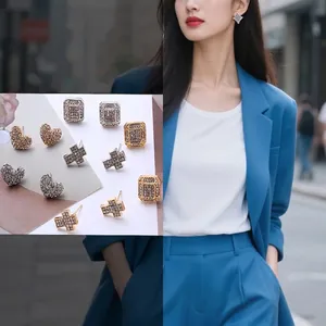 Elegant gold and silver heart-shaped and geometric stud earrings with pave crystals