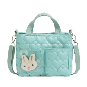 Mint green quilted heart handbag for girls featuring a cute plush bunny patch and strap