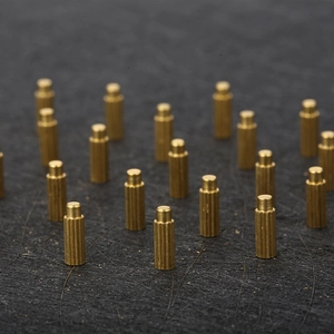 Golden brass cylindrical hardware parts with stepped top and knurled anti-slip texture