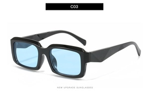Close-up of square black sunglasses with light blue lenses and C03 model marking