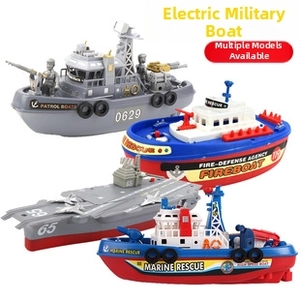 Set of four electric toy ships including patrol boat, fireboat, and aircraft carrier
