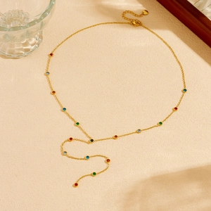 Elegant gold Y-shaped stainless steel necklace with colorful round gemstone pendants
