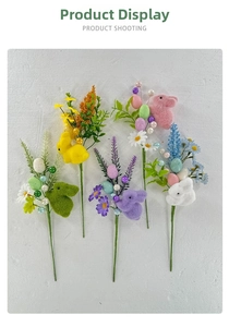 Macro detail of artificial Easter egg stems with colorful flocked bunnies and foam eggs