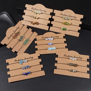 Detailed close-up of handmade braided cord bracelets with natural crystal stone chips