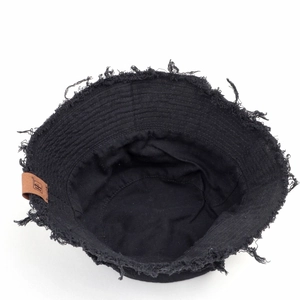 Stylish black cotton bucket hat with frayed edges and brown leather patch at 45-degree angle