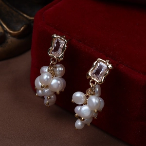 Grape-style baroque pearl earrings with cubic zirconia and gold plating on velvet box