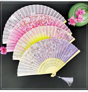 Bamboo folding fans with cherry blossom prints and elegant tassels in assorted colors