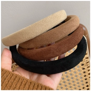 Set of four suede sponge headbands in beige, brown, and black for high skull top styling
