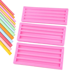 Pink silicone long strip molds for DIY candles and chocolate with colorful samples
