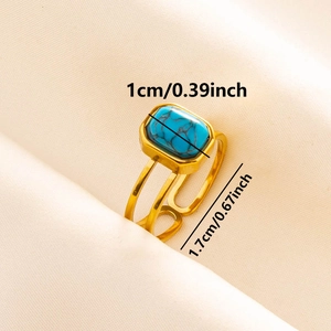 Close-up of gold stainless steel ring with rectangular turquoise stone and size dimensions