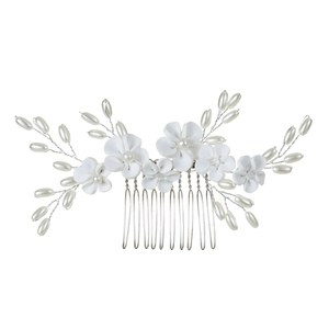 Elegant bridal hair comb with white clay flowers and silver-toned faux pearls
