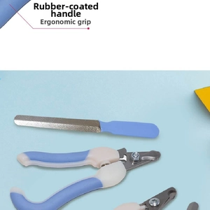 Detail of rubber-coated ergonomic handle and metal nail file for pet grooming