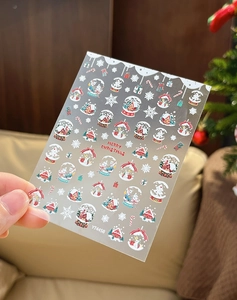 Vue détaillée des stickers ongles Noël YT4458 avec motifs Père Noël et flocons de neige