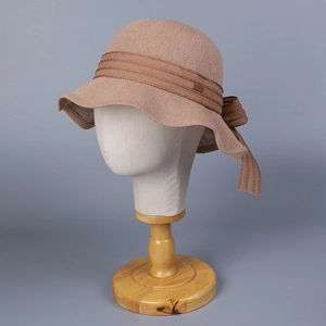 Breathable wide brim knitted sun hat with large bow detail in lotus pink color