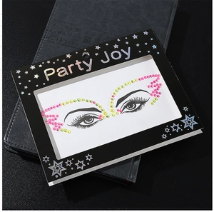Detail view of colorful self-adhesive eye rhinestones in premium star-shaped packaging