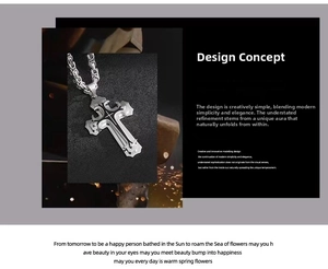 Detailed close-up of a dual-layer black and silver stainless steel cross pendant necklace