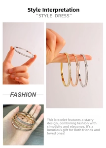 Detailed close-up of three-color crystal paved titanium steel bangles for women