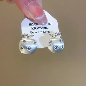 18K gold plated apple stud earrings with matte finish and sparkling star-cut zircons