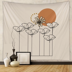 Détail de la tapisserie murale bohème avec art floral linéaire et motif soleil