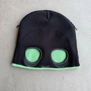 Funny Halloween knit beanie in black and neon green with cartoon eyes and cool street style