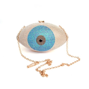 Detailed macro view of an Evil Eye evening clutch bag with blue and silver rhinestones