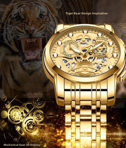 Macro view of SLBAQUA gold skeleton dial showing mechanical gear movement and WR 500 meter