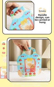 Detail of cute cartoon Christmas cookie bag with handle and strawberry bear patterns