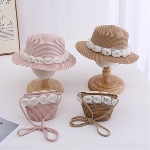 Straw sun hat and matching woven bag set with cream lace roses for toddler girls