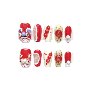 Handmade Chinese Lion Dance press-on nails set with red 3D elements and lucky charms