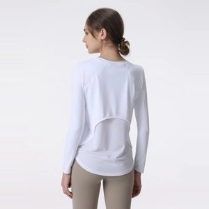 Women's breathable long sleeve yoga top in white with mesh back detail and layered design