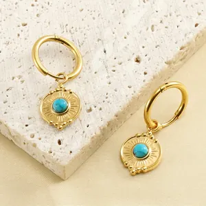 Golden 18K stainless steel hoop earrings featuring turquoise center and sunburst engraving