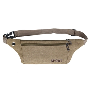 Detail view of khaki sports waist bag featuring double zippers and integrated earphone port