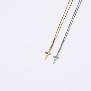 Minimalist stainless steel cross necklaces in gold and silver colors for layering
