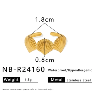 Detailed view of gold shell ring with measurements, waterproof and hypoallergenic features