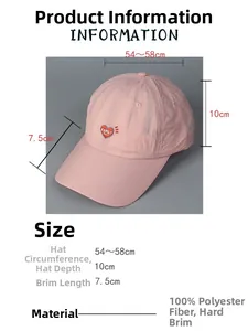Pink baseball cap with red heart embroidery showing dimensions and 100% polyester material