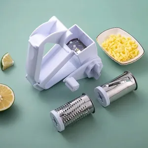 Manual rotary cheese grater with three interchangeable stainless steel blades and white frame