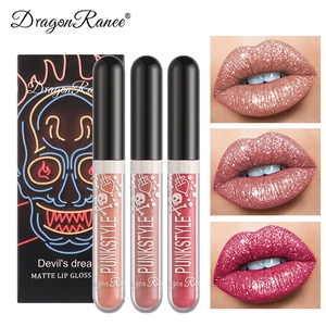 Three-piece Halloween lip gloss set with glitter matte finish in purple and black tones