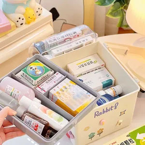 Ambulance-style double-layer home medicine storage box with cute stickers and portable handle