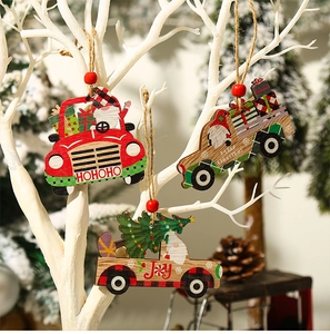 Close-up of wooden Christmas car hanging ornaments with festive prints on white branches