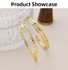 Detail of 18K gold plated minimalist double-layered cuff bracelet with rectangular beads