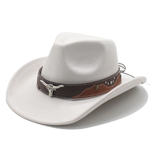 Close-up of the brown leather band with silver bull head emblem on a suede cowboy hat